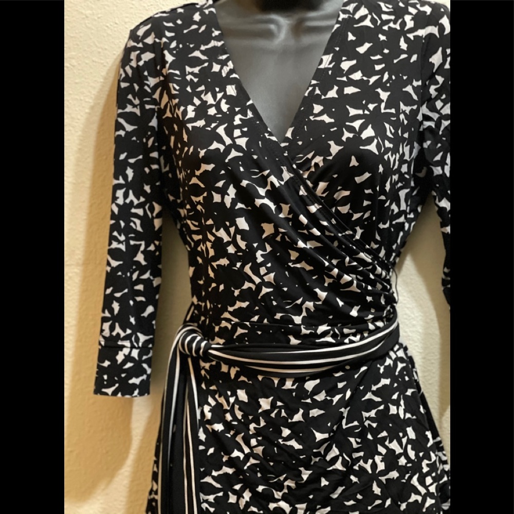 Black long sleeve rayon wrap around top